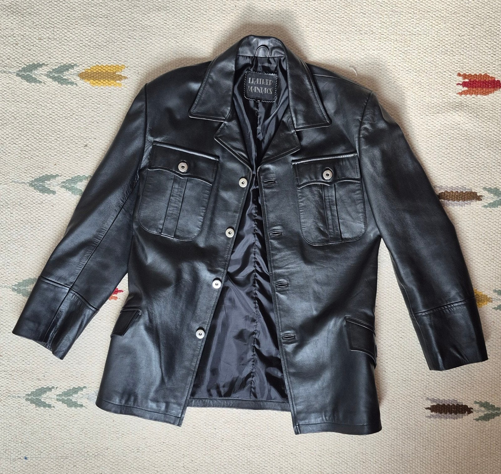 TE KOOP: leren uniformjas, Leather Maniacs, mt M, gay?, Ophalen of Verzenden, Zo goed als nieuw, Zwart