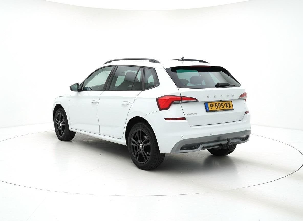 Skoda Kamiq 1.0 TSI Sport Business TREKHAAK CRUISE CLIMA, Gebruikt, Leder en Stof, Wit, Origineel Nederlands