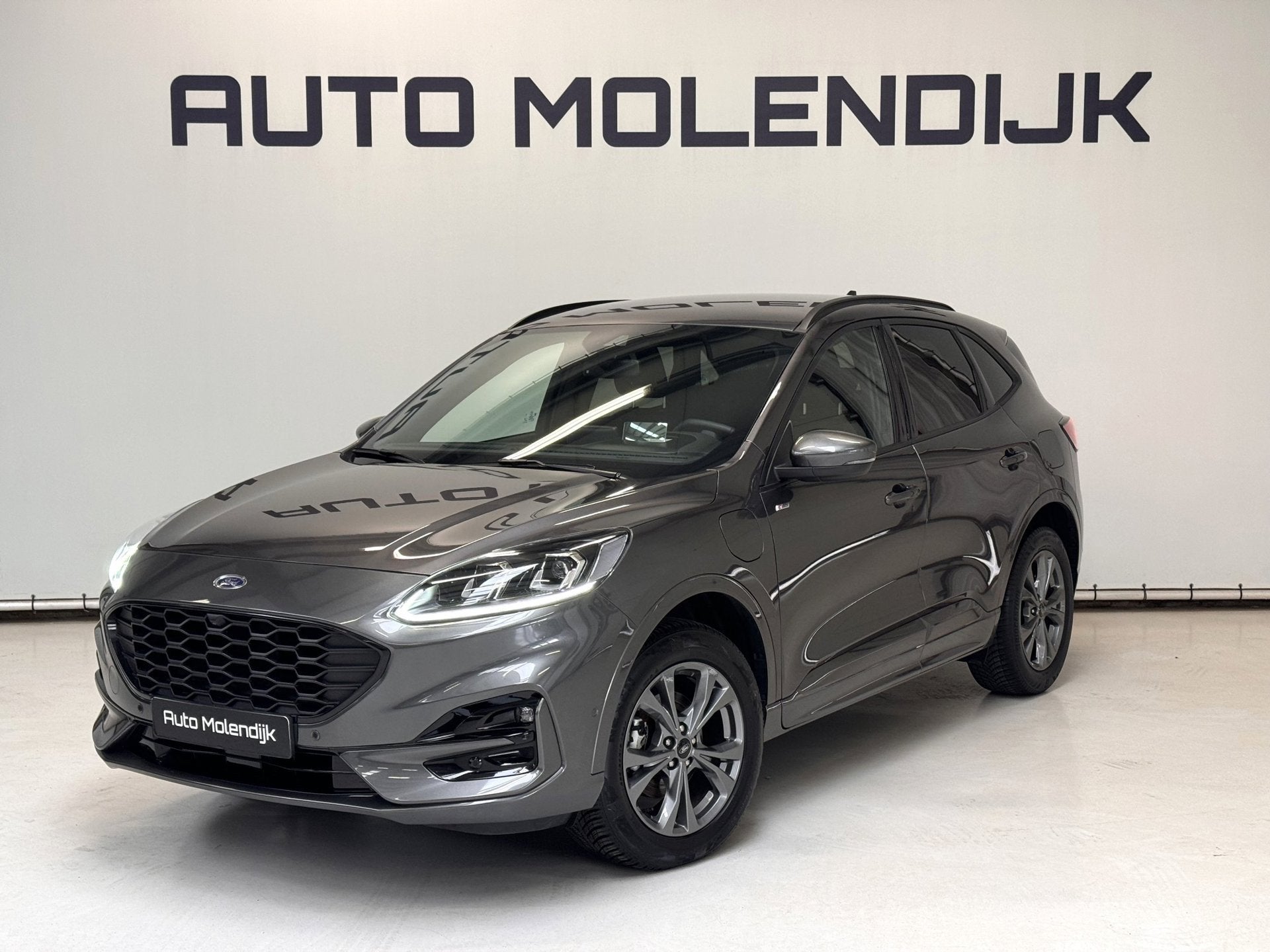 Ford Kuga 2.5 PHEV ST-Line X Alcantara / trekhaak elektr / H, Auto's, Dealer onderhouden, Gebruikt, Zwart, 4 cilinders