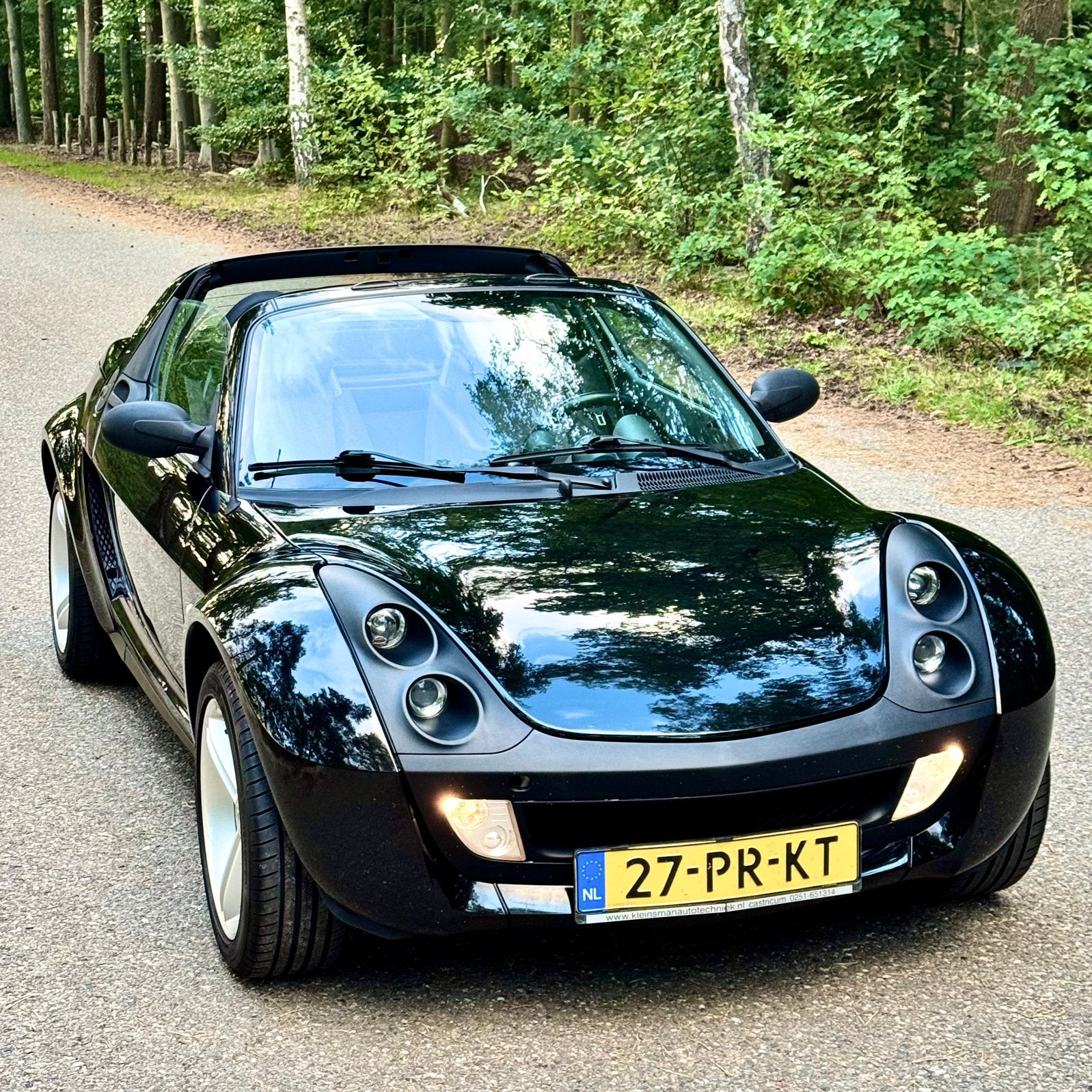 Smart Roadster 2004 Zwart Cabrio met hardtop NL-auto, Zwart, Handgeschakeld, Grijs, 23 €/maand
