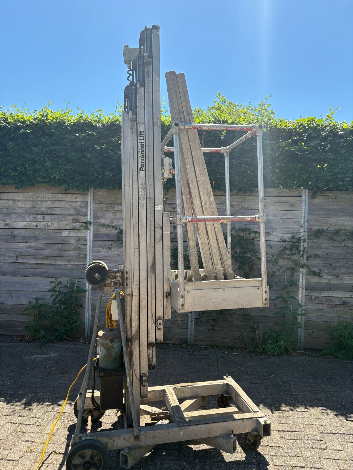 Genie personen lift - hoogwerker, Ophalen