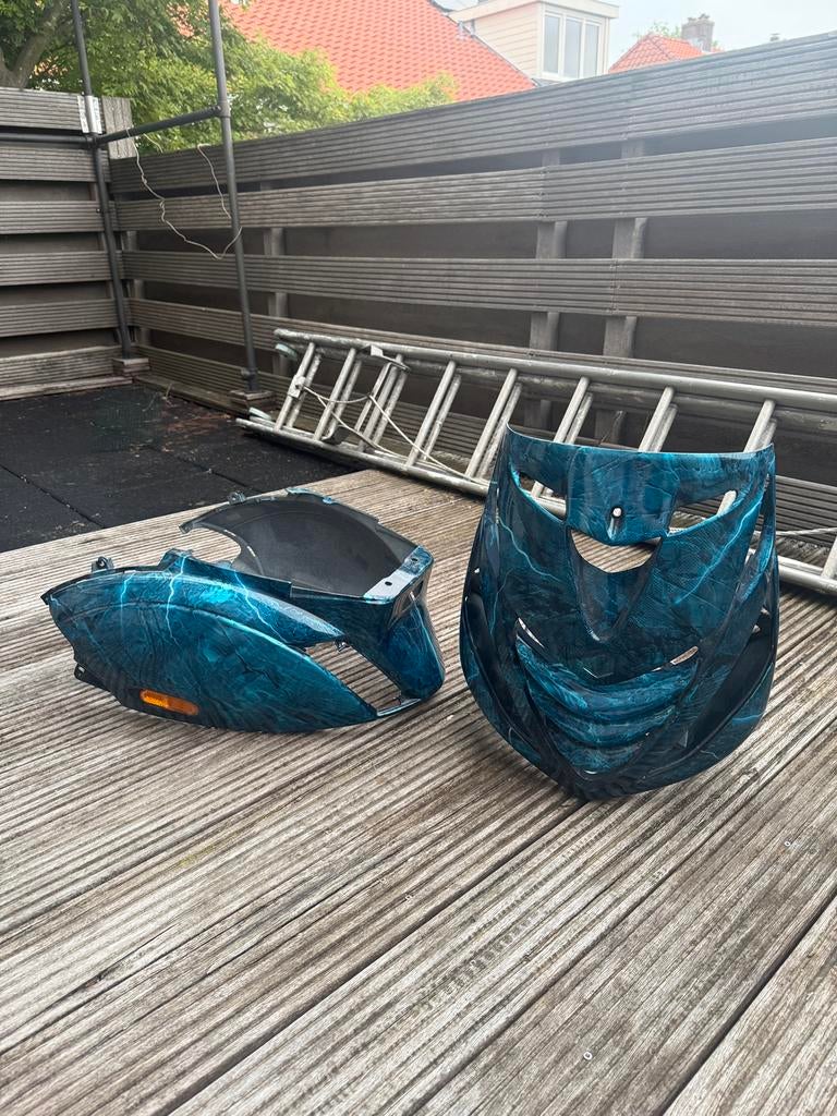 Piaggio zip custom kappenset, Ophalen