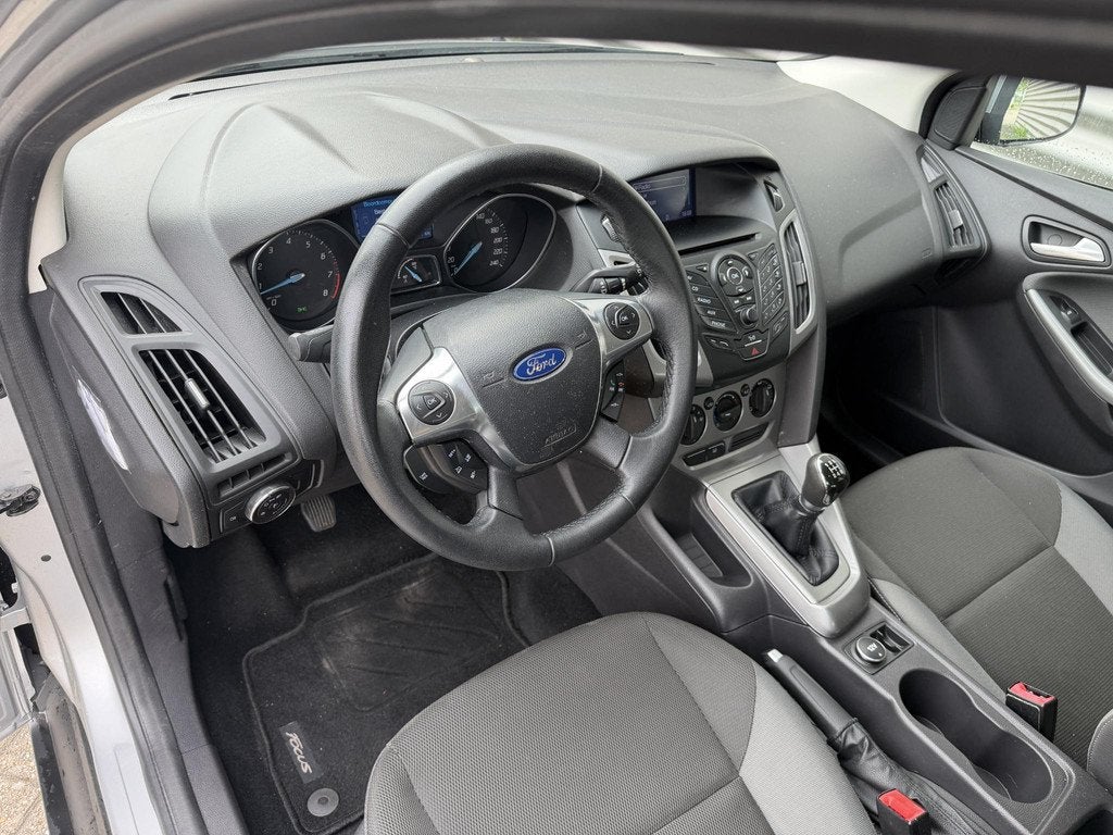 Ford Focus 1.6 TI-VCT Ambiente 1e Eigenaar, Auto's, Stof, 4 cilinders, 635 kg, Origineel Nederlands