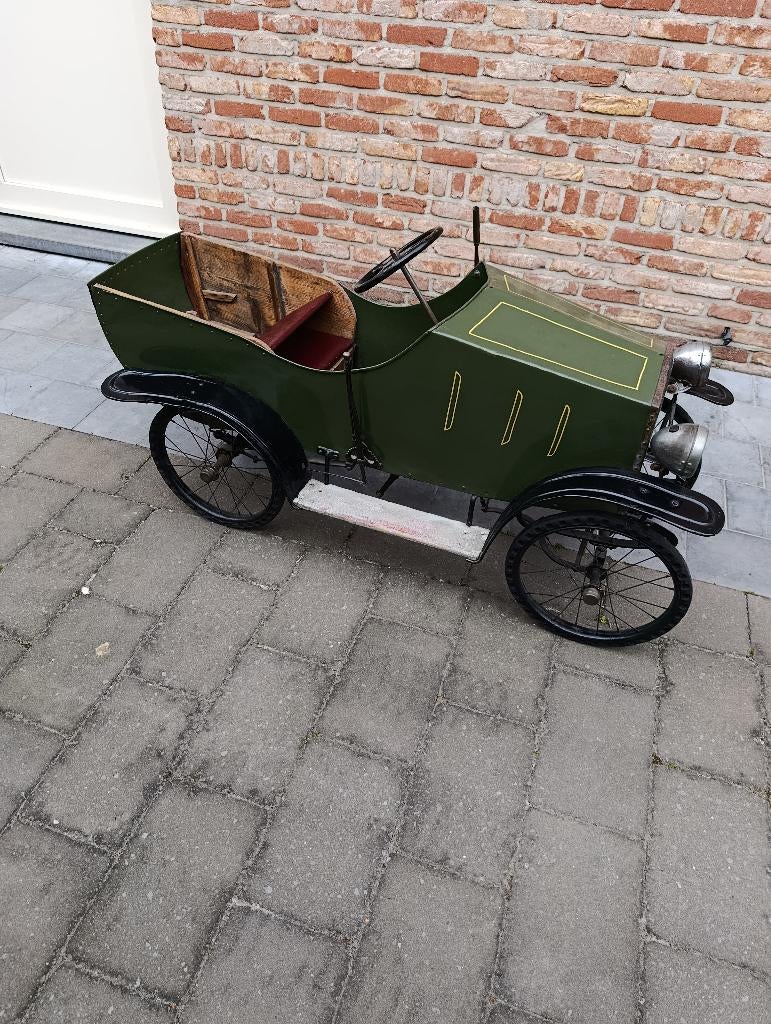 Heel oude trapauto, Ophalen