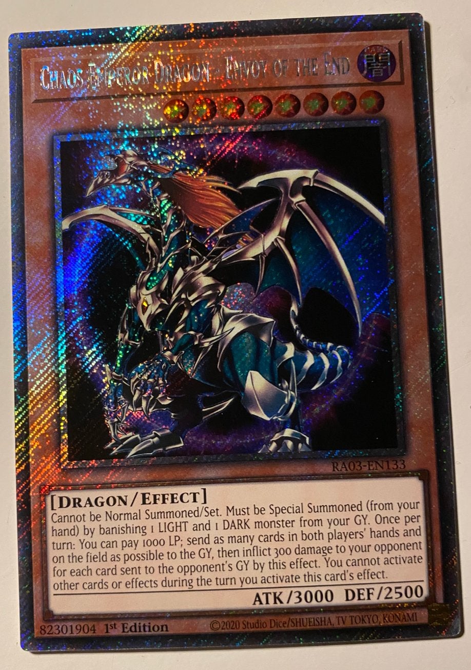 Yu-Gi-Oh! Chaos Emperor Dragon - Envoy RA03 1st edition !, Ophalen of Verzenden, Zo goed als nieuw, Losse kaart, Foil