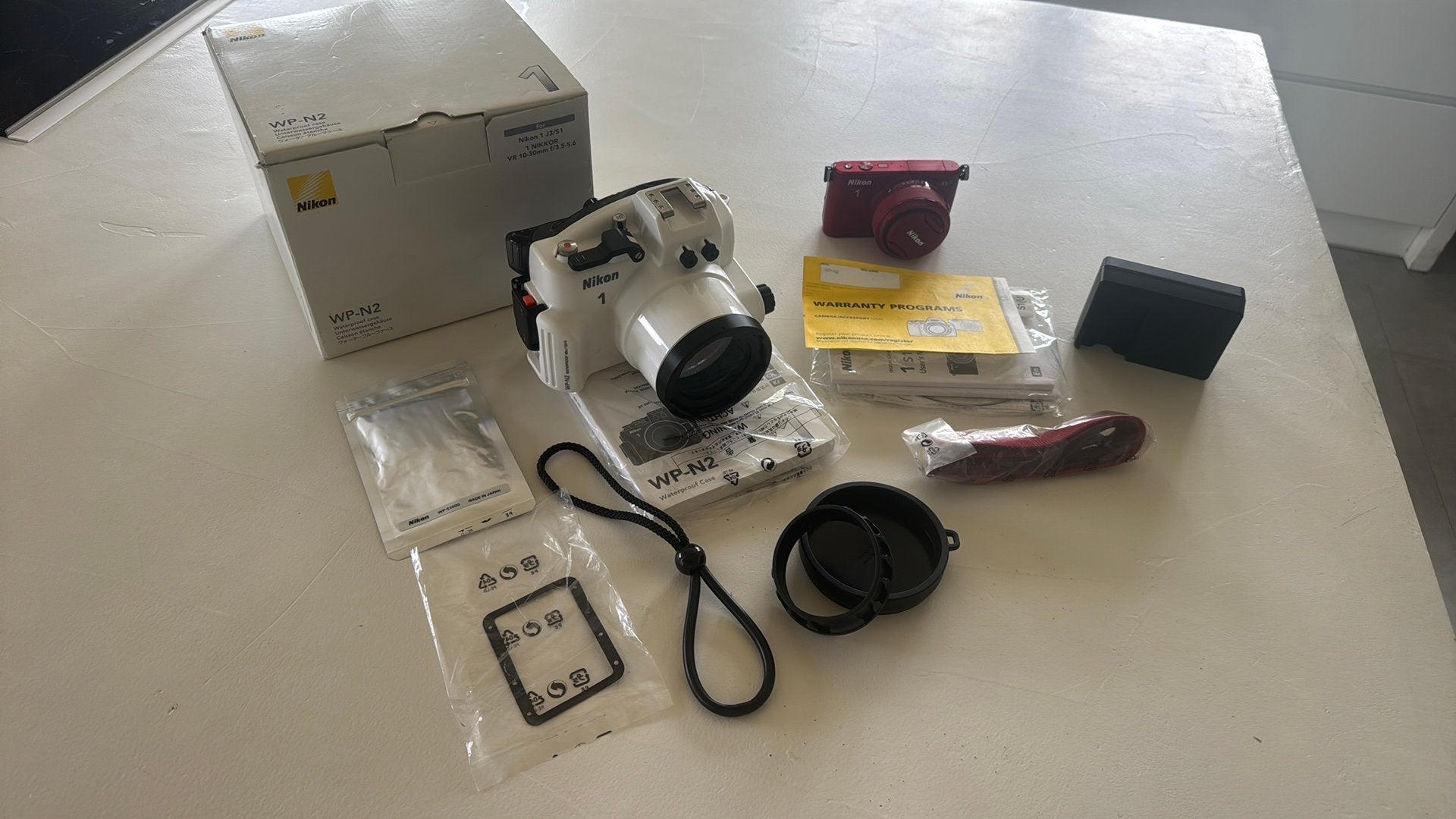 Nikon S1 camera met WP-N2 onderwaterbehuizing, Audio, Tv en Foto, Fotografie | Onderwatercamera's, Ophalen of Verzenden, Nieuw