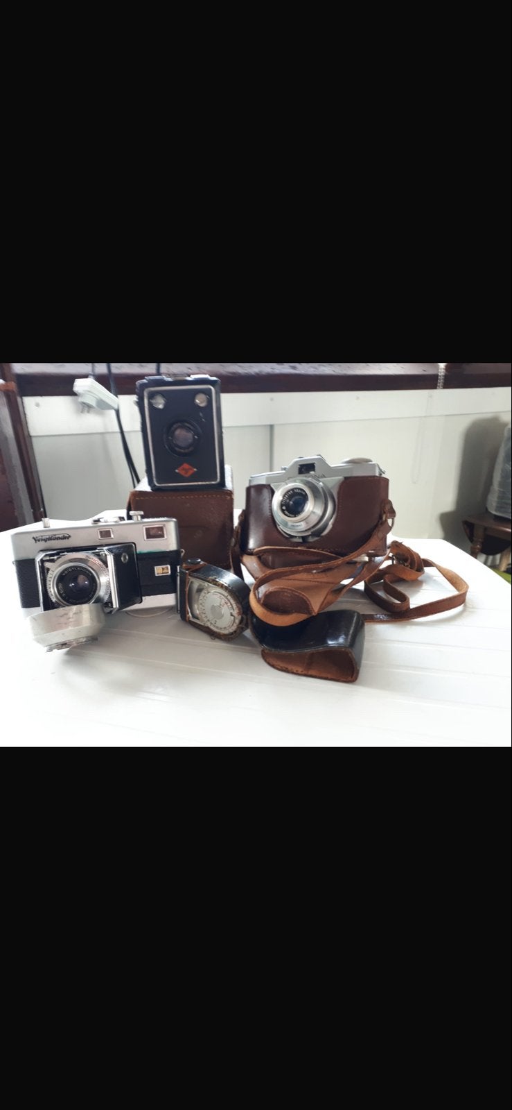 Partij vintage fotocamera’s met leren hoezen – Voigtländer &, Ophalen of Verzenden, Gebruikt, Compact, Overige Merken