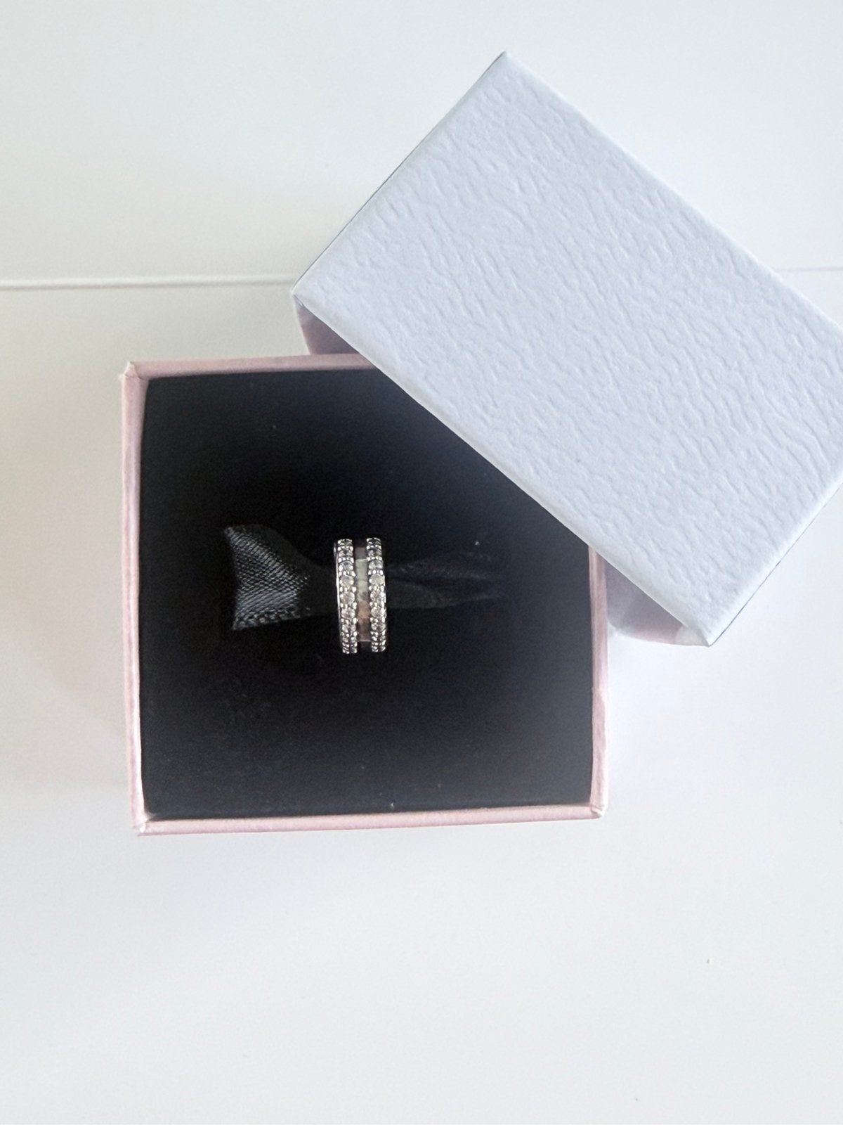 Pandora silicone clipcharm, Ophalen of Verzenden, Zo goed als nieuw, Zilver, Pandora