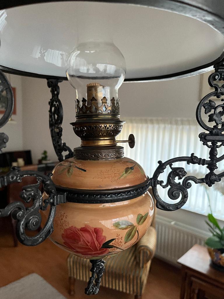 olielamp hangend, Ophalen