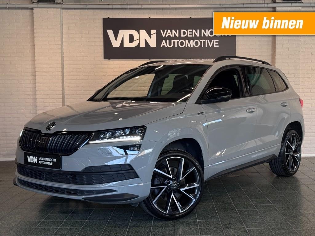 Skoda KAROQ 1.5 TSI Sportline Business Trekhaak Stoel- en st, Auto's, Automaat, USB, 4 cilinders, Karoq