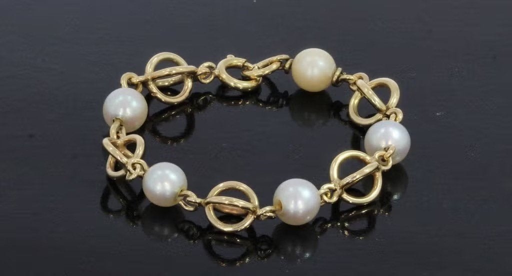 Baby kinder armband parels 14k gouden design schakel, Voordeelsieraden, Ophalen of Verzenden, Zo goed als nieuw, Postbus 163, 8320 AD Urk