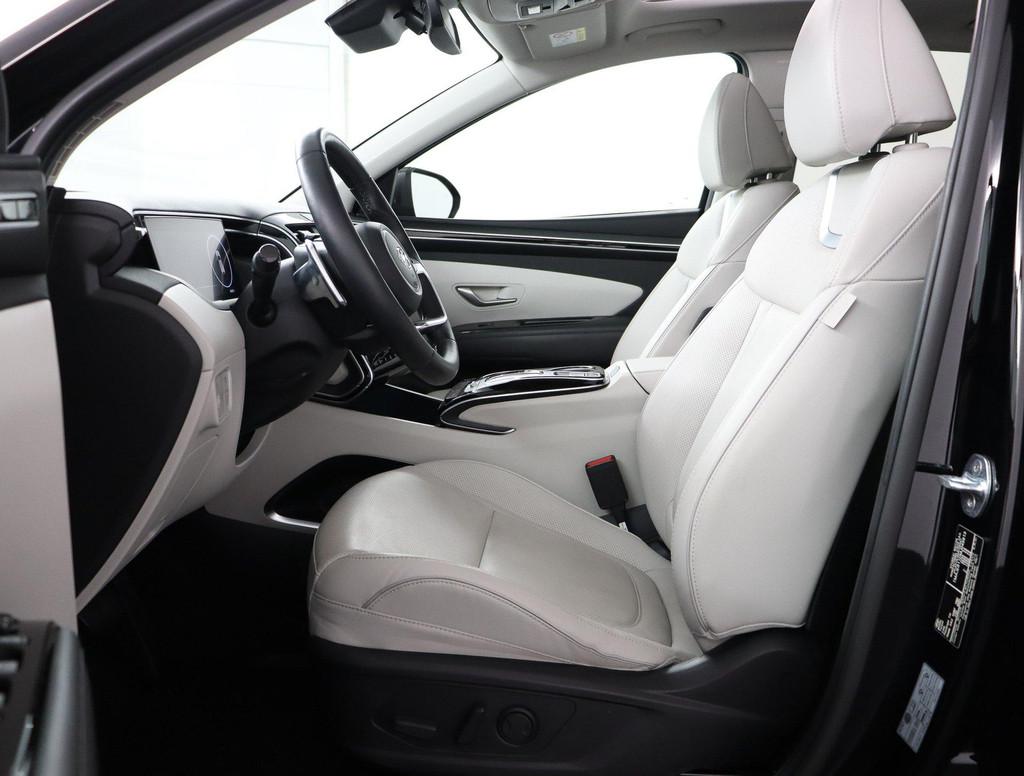 Hyundai Tucson 1.6 T-GDI HEV Premium Sky | Automaat | Bomvol, Auto's, Gebruikt, Euro 6, 4 cilinders, 1650 kg
