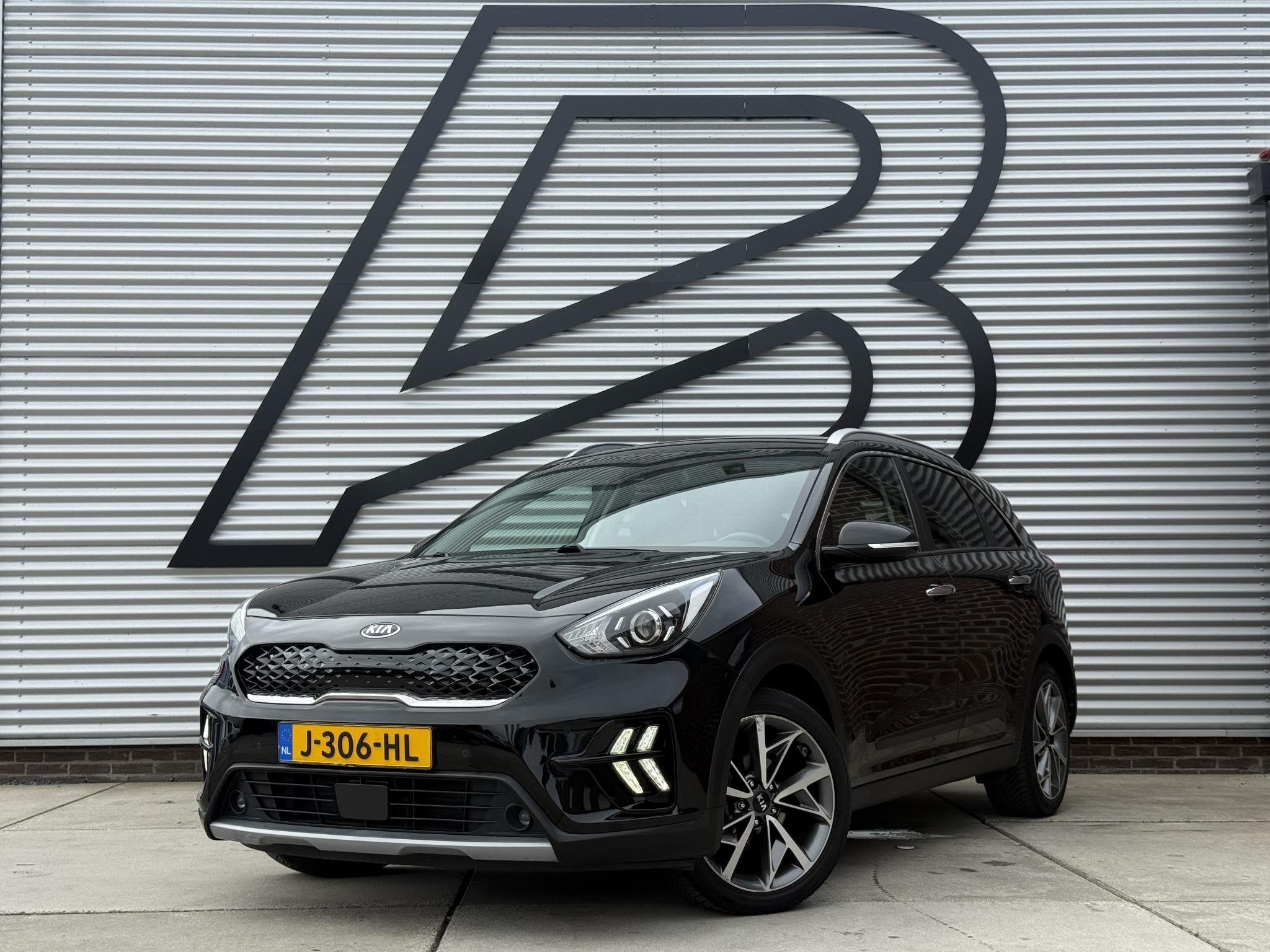 Kia Niro 1.6 GDi Hybrid DynamicPlusLine 2e Eigenaar|Navi|Cam, Auto's, Gebruikt, Euro 6, 2 kWh, Zwart