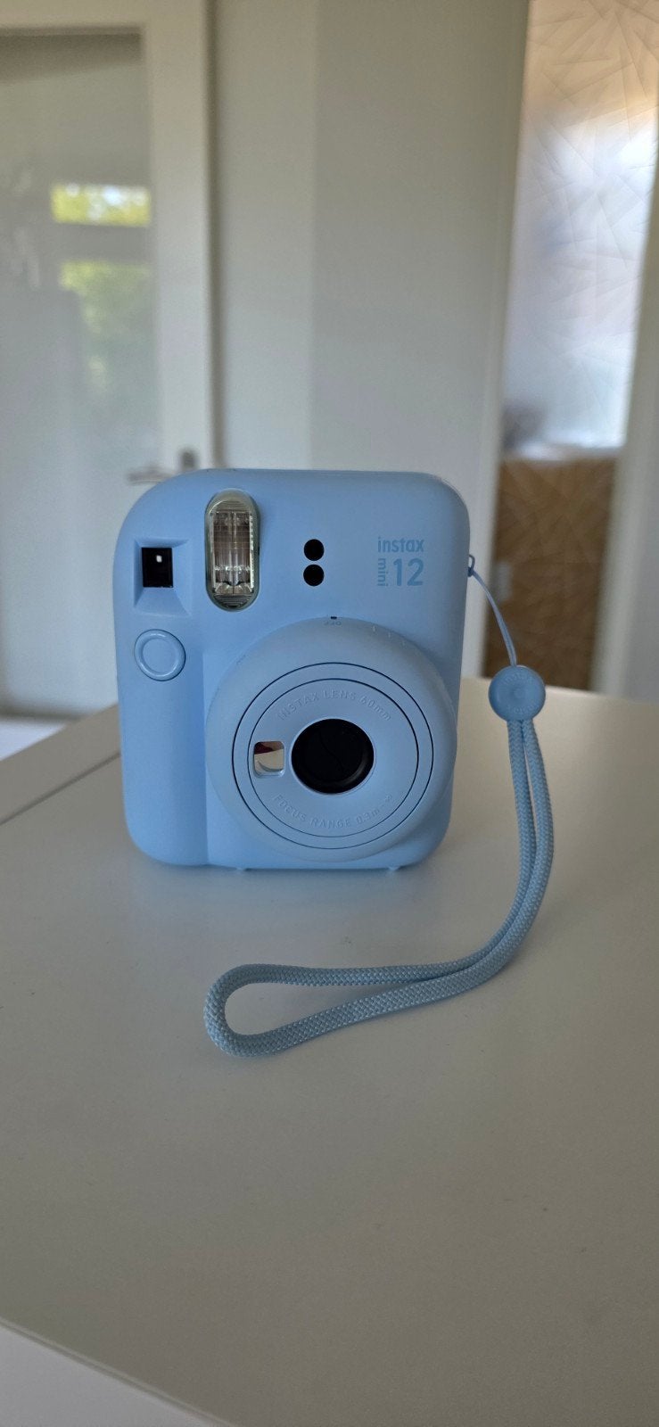 Fujifilm Instax Mini 12 instant camera blauw, Ophalen of Verzenden, Zo goed als nieuw, Polaroid, Fuji