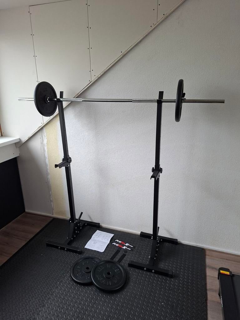Haltersteunen en barbell + 4 schijven van 11,4kg, Sport en Fitness, Ophalen, Zo goed als nieuw, Halterset