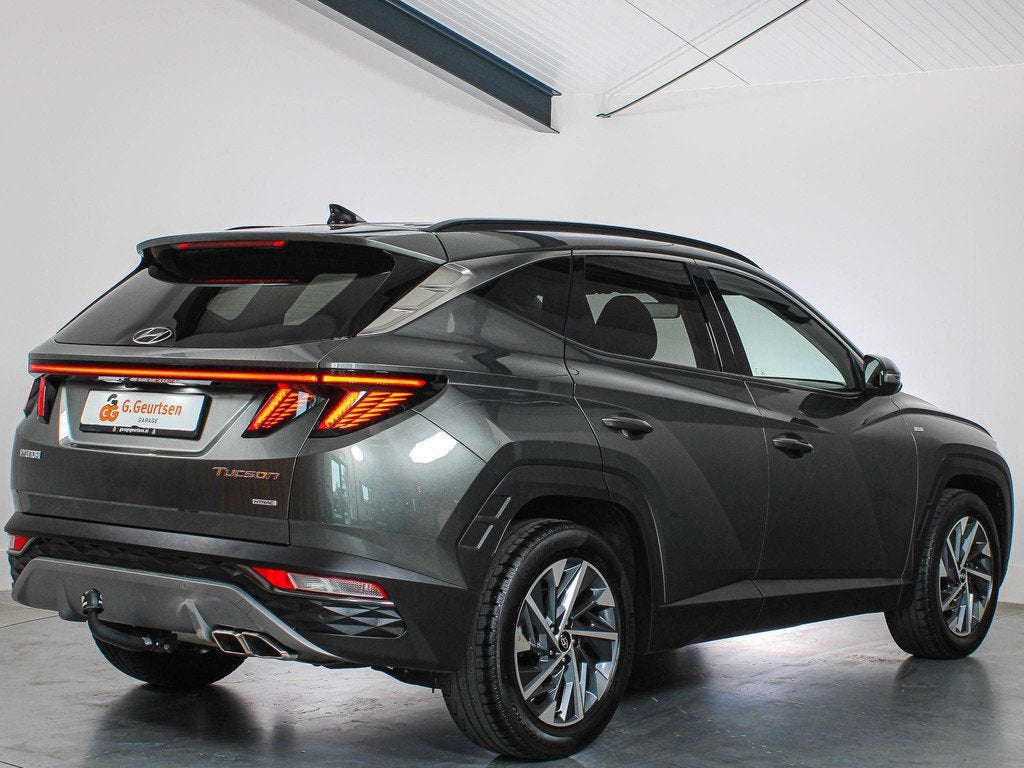 Hyundai Tucson 1.6 T-GDI 132kW 48V Comfort DCT 4WD Trekhaak,, Stof, Gebruikt, 4 cilinders, 179 pk