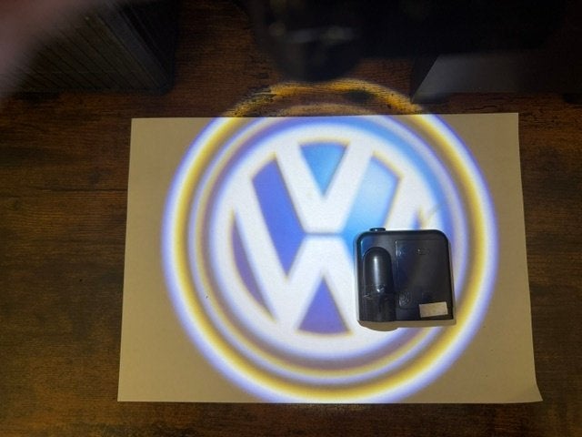 Te koop 2 Nieuwe Deur verlichting voor VW  met blauw VW logo, Ophalen of Verzenden, Nieuw