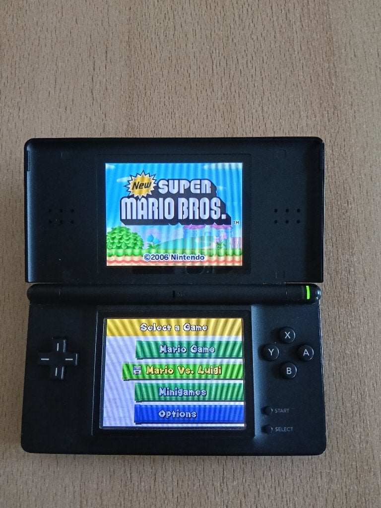 nintendo ds lite  met spel new super mario bros, Ophalen, Met games, Zwart, Zo goed als nieuw