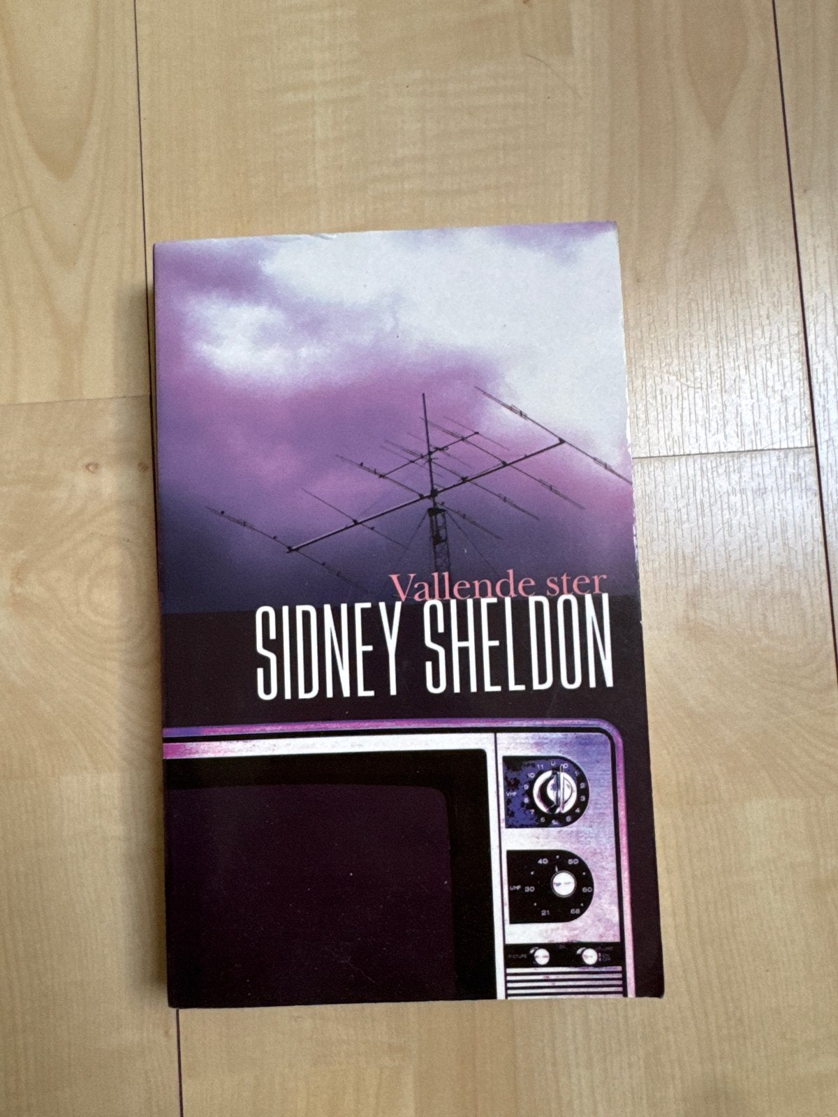 Vallende Ster - Sidney Sheldon (Boek), Ophalen of Verzenden, Gelezen, Nederland