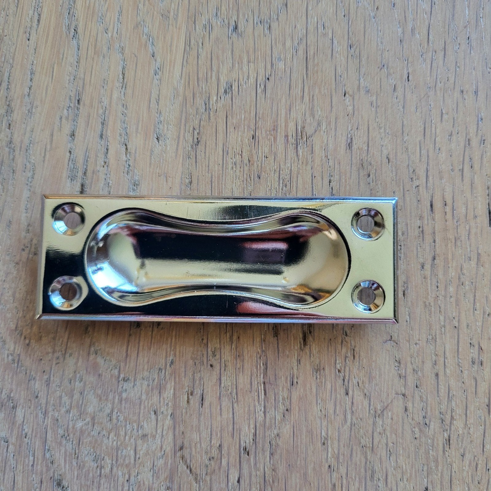 Meubelschuifdeurkom nikkel, Ophalen