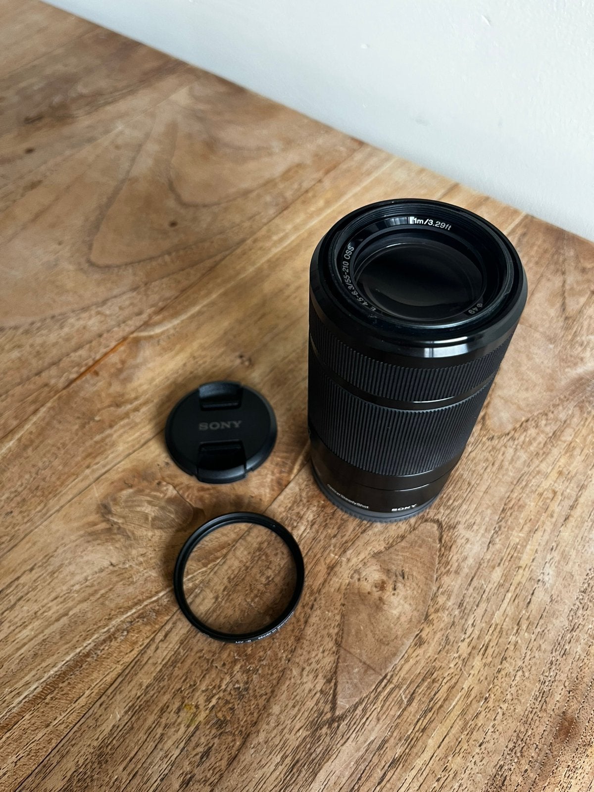 Sony E 55-210 mm F4.5-6.3 OSS telelens + UV-filter, Ophalen of Verzenden, Zo goed als nieuw, Telelens