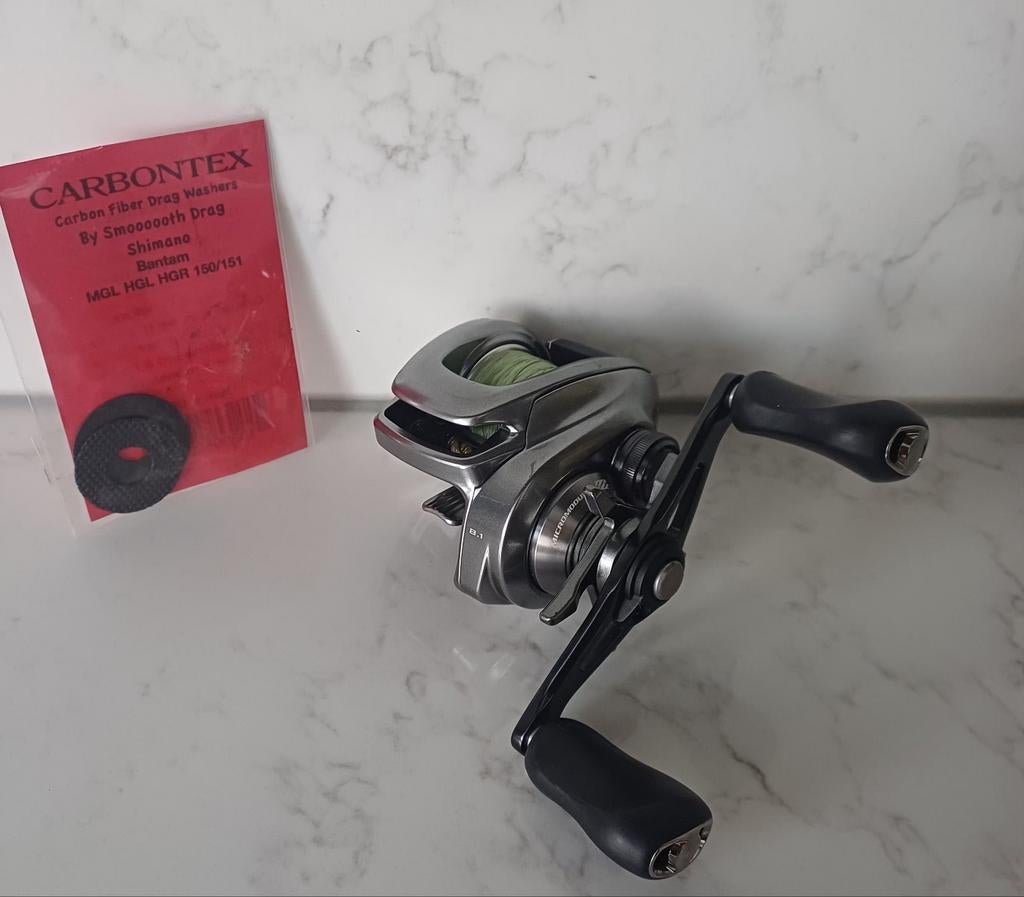Shimano Bantam 151 + Carbontex en bearing upgrade, Watersport en Boten, Hengelsport | Roofvissen, Gebruikt, Molen, Ophalen of Verzenden