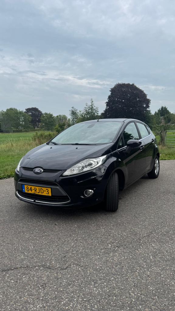 Ford Fiësta 1.25 44KW 5DR 2011 Zwart, Auto's, Ford, Voorwielaandrijving, Stof, 40 €/maand, 4 cilinders