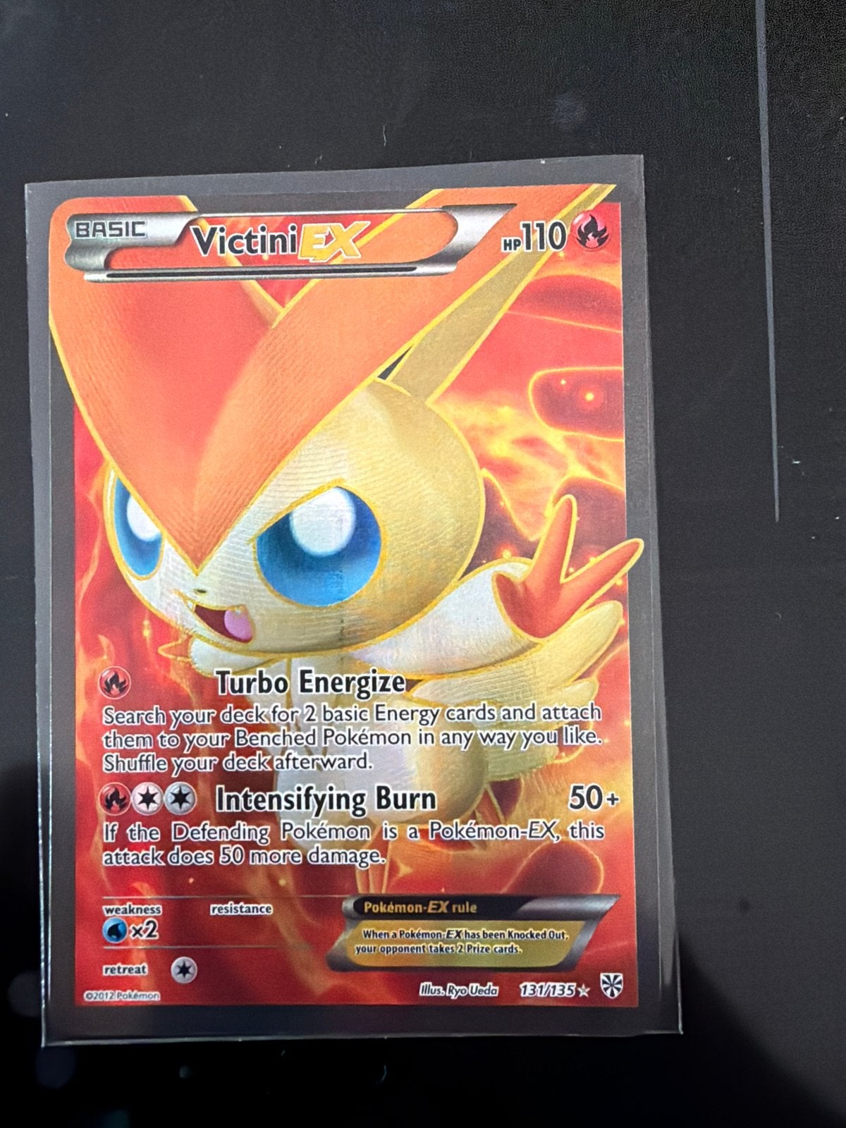 Victini EX Pokémon Kaart (131/135) - Zeldzaam, Ophalen of Verzenden, Zo goed als nieuw, Losse kaart