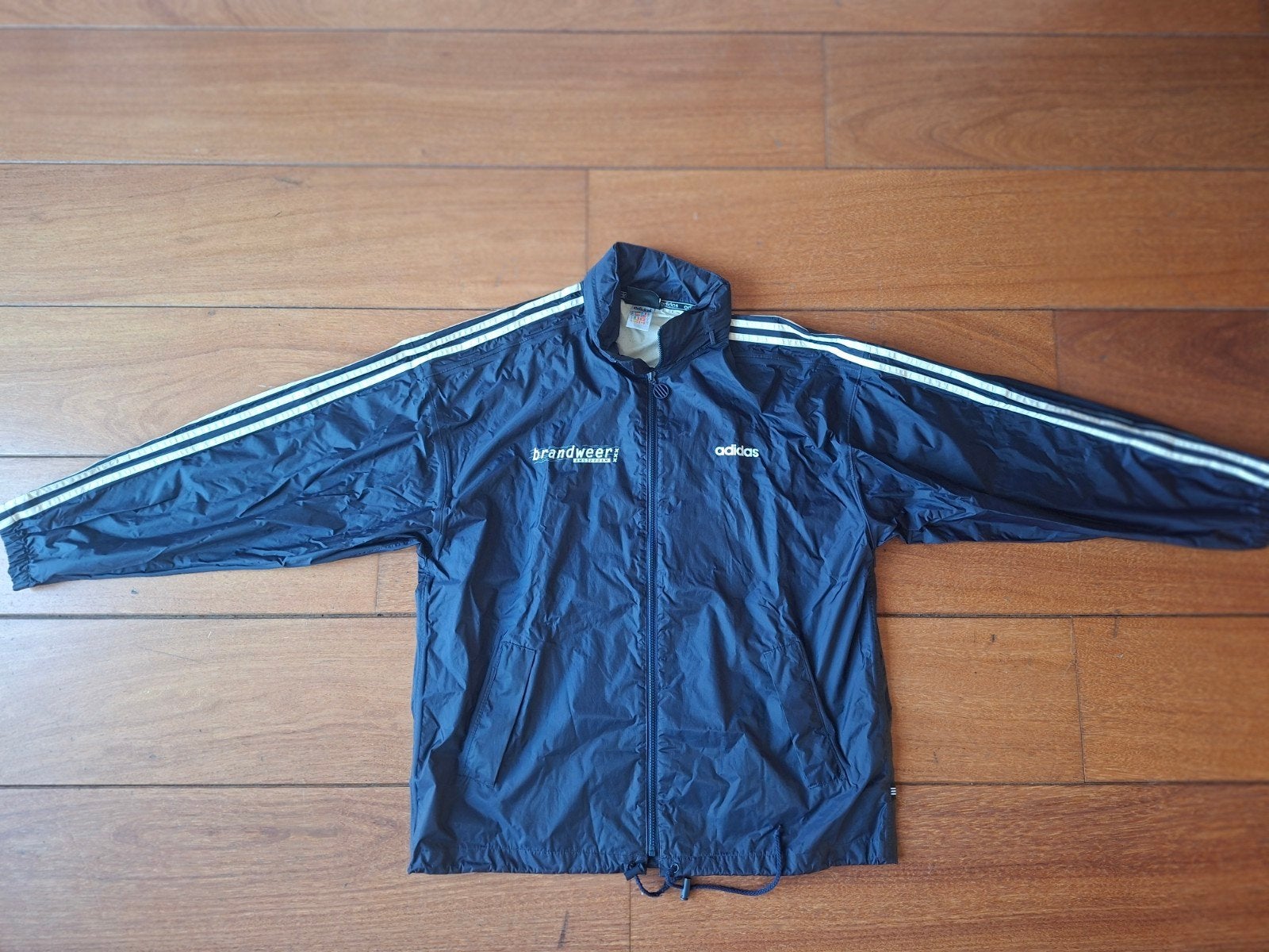 Adidas trainings (regen) jack Brandweer Amsterdam, Kleding | Heren, Ophalen of Verzenden, Algemeen