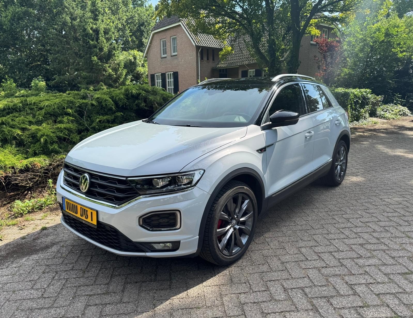 Volkswagen T-Roc 2.0 TSI 190pk 4 Motion 7-DSG 2018, Automaat, Leder en Stof, Wit, Vierwielaandrijving