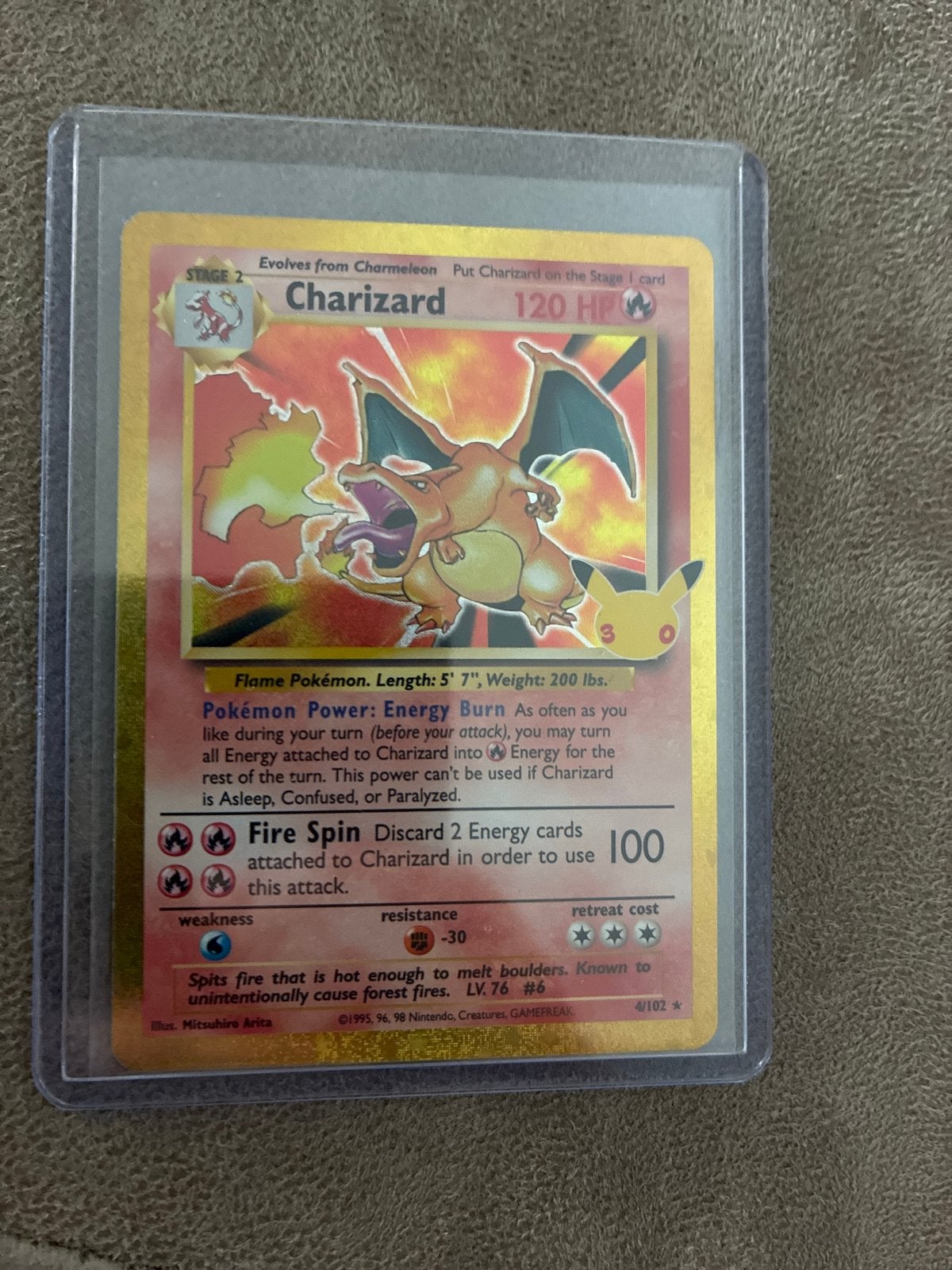 Pokémon Charizard 4/102 30th. Celebrations Holo Kaart, Ophalen of Verzenden, Zo goed als nieuw, Losse kaart, Foil