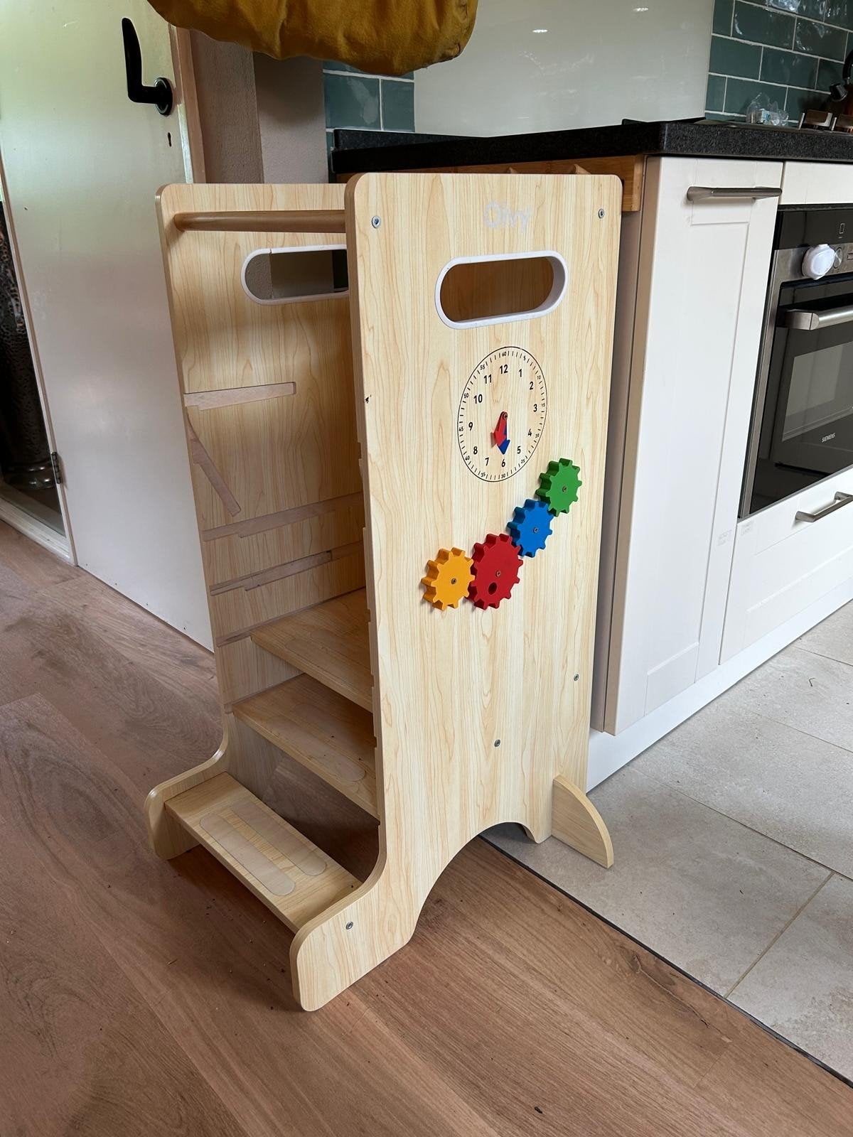 Houten leertoren met glijbaan en activiteitenbord, Ophalen, Zo goed als nieuw