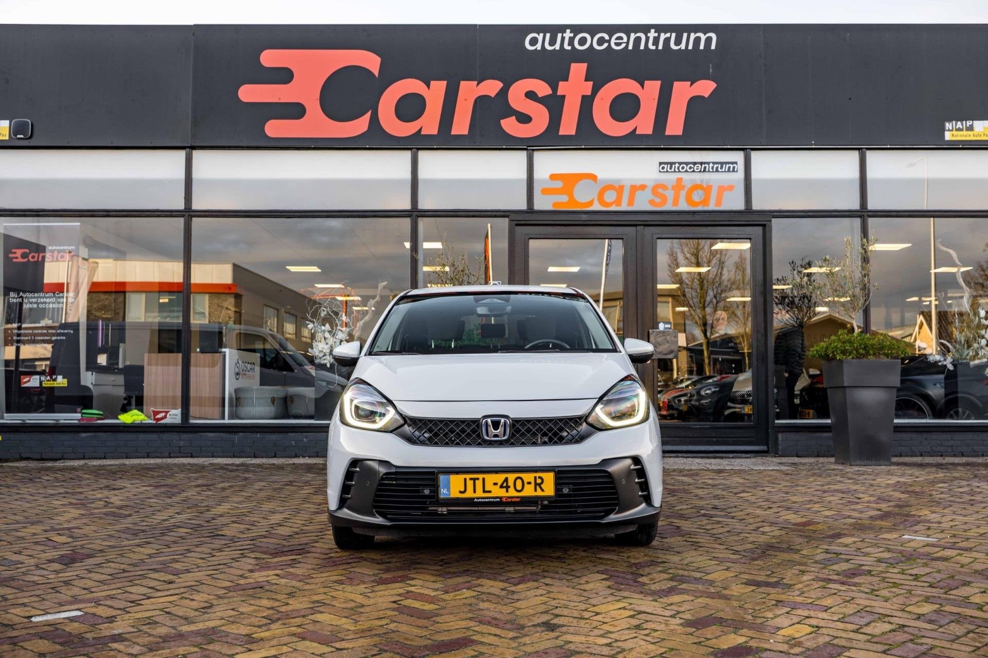 Honda JAZZ 1.5 e:HEV Advance|Car Play|Camera|Clima, Auto's, Honda, Dealer onderhouden, Stof, 4 cilinders, Wit