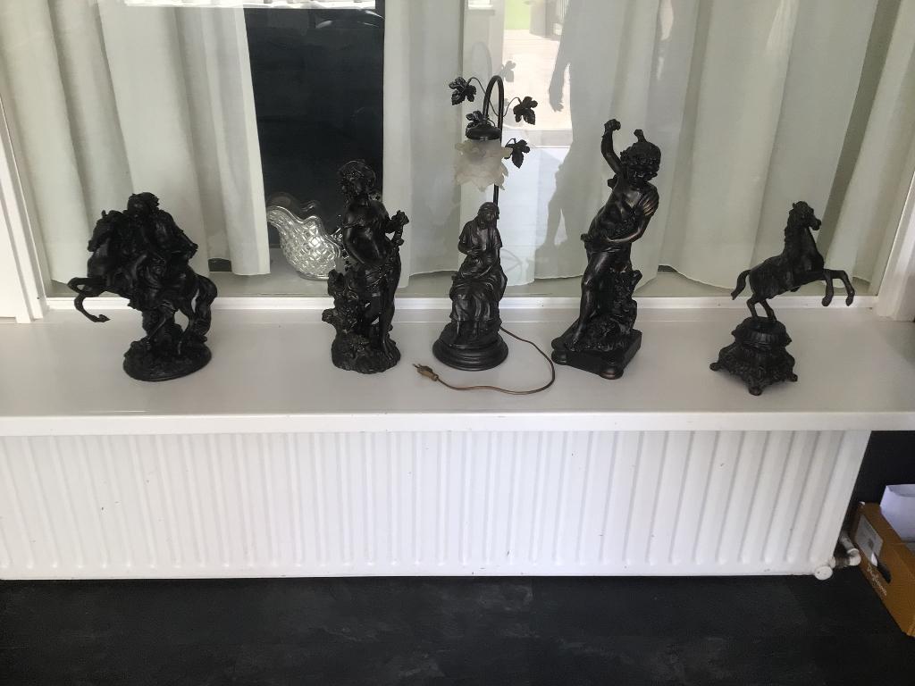Gietijzeren beelden, Ophalen