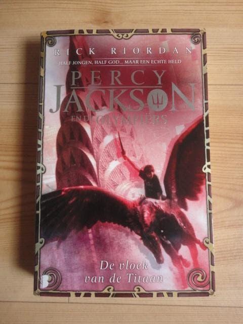 Te koop: De vloek van de Titaan - Rick Riordan, Ophalen of Verzenden, Gelezen, Rick Riordan