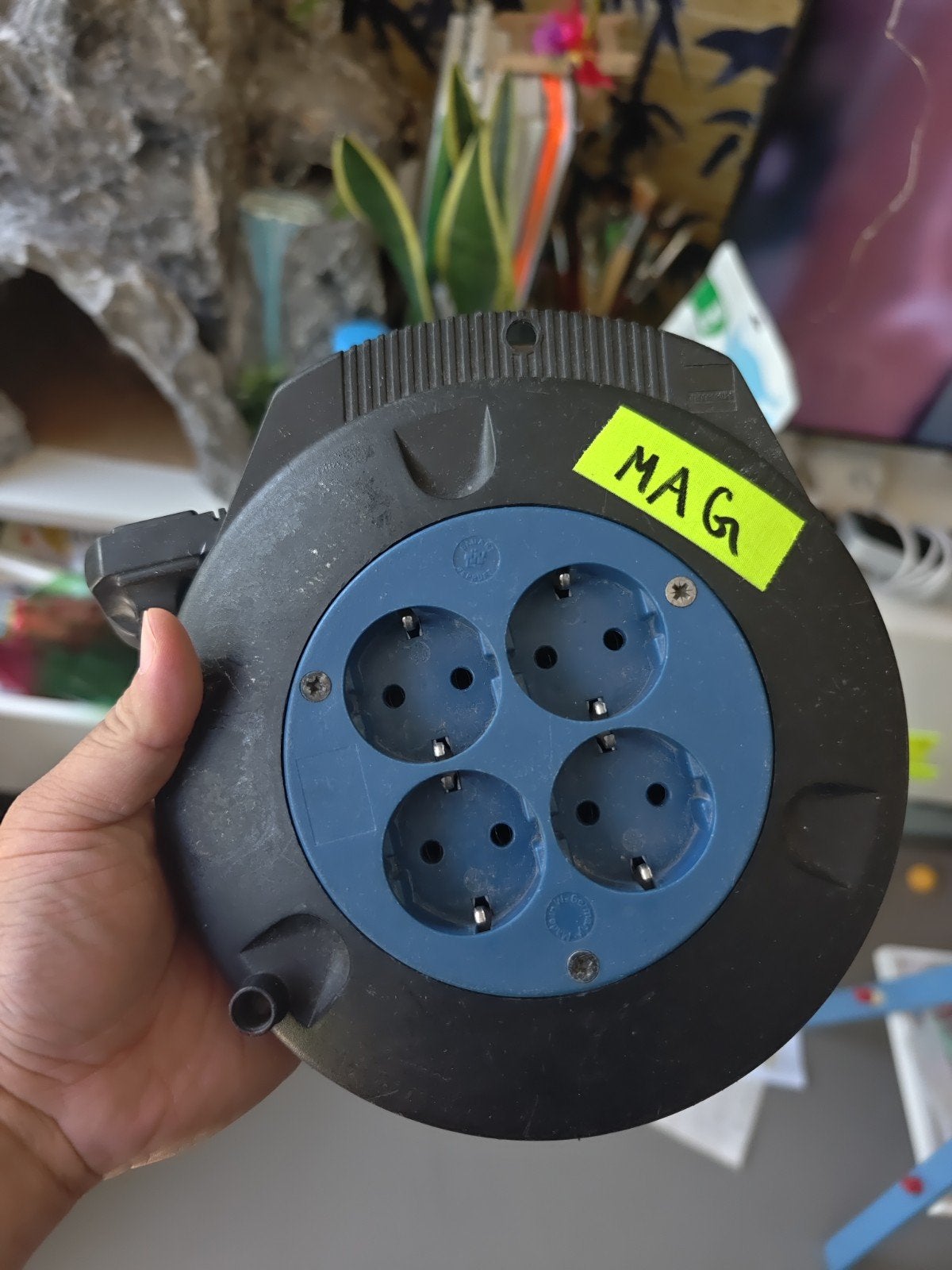 Kabelhaspel met 4 stopcontacten, Ophalen