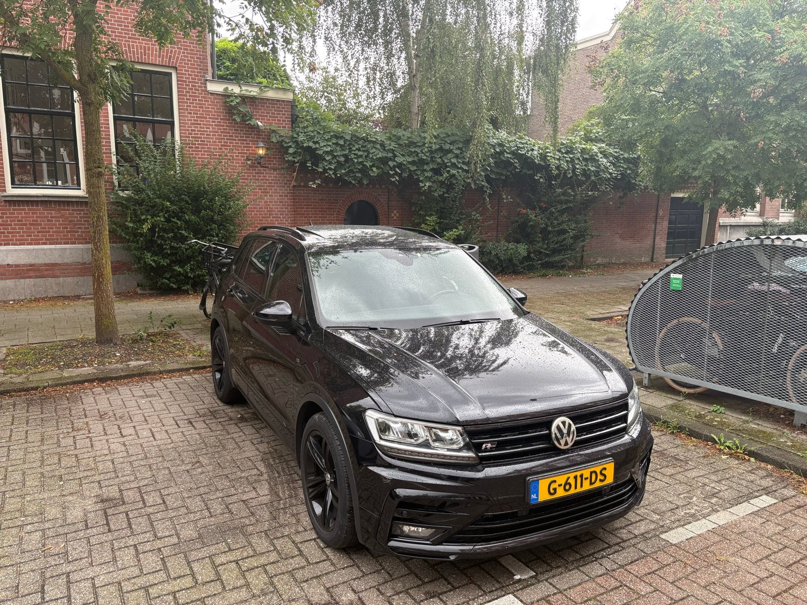 Volkswagen Tiguan 1.5 TSI DSG Black Edition 2019, Auto's, Zwart, 4 cilinders, Lichtsensor, Zwart