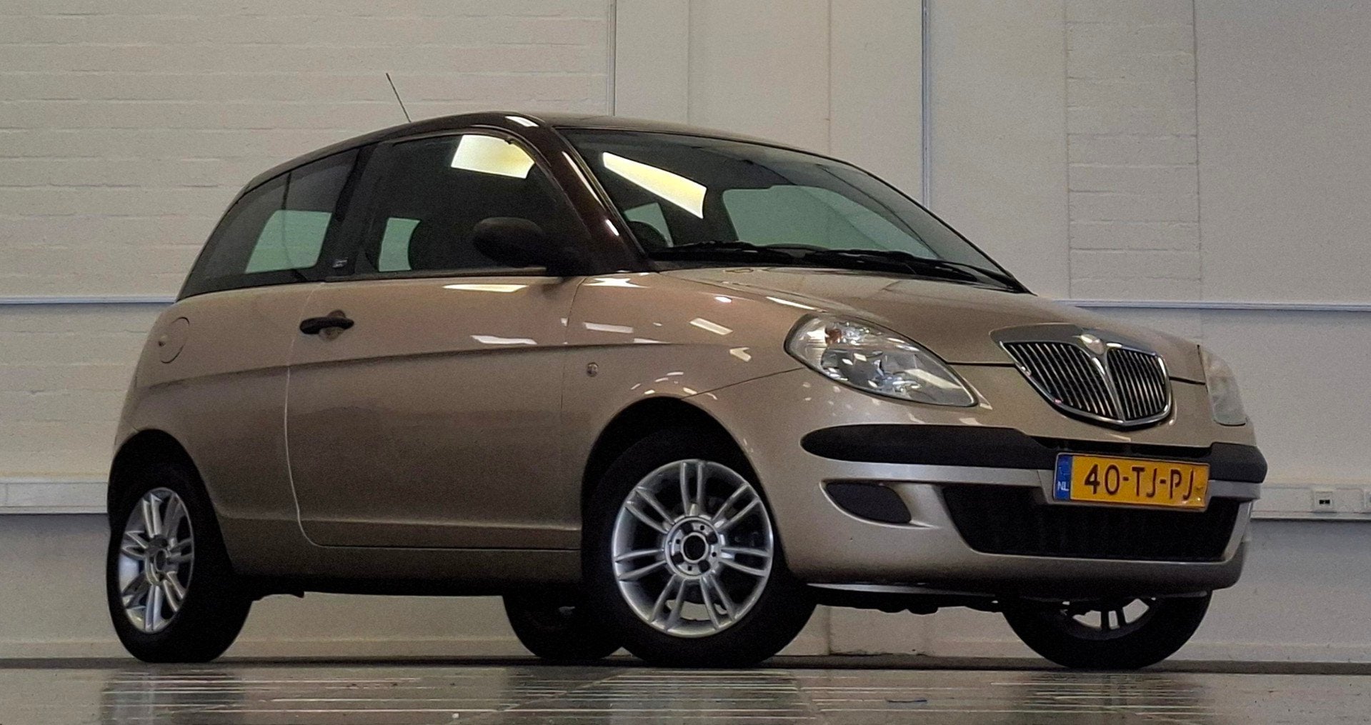 Lancia Ypsilon 1.2-16V MomoDesign 16-09-2027 APK Airco Garan, Auto's, Voorwielaandrijving, Stof, Gebruikt, Beige
