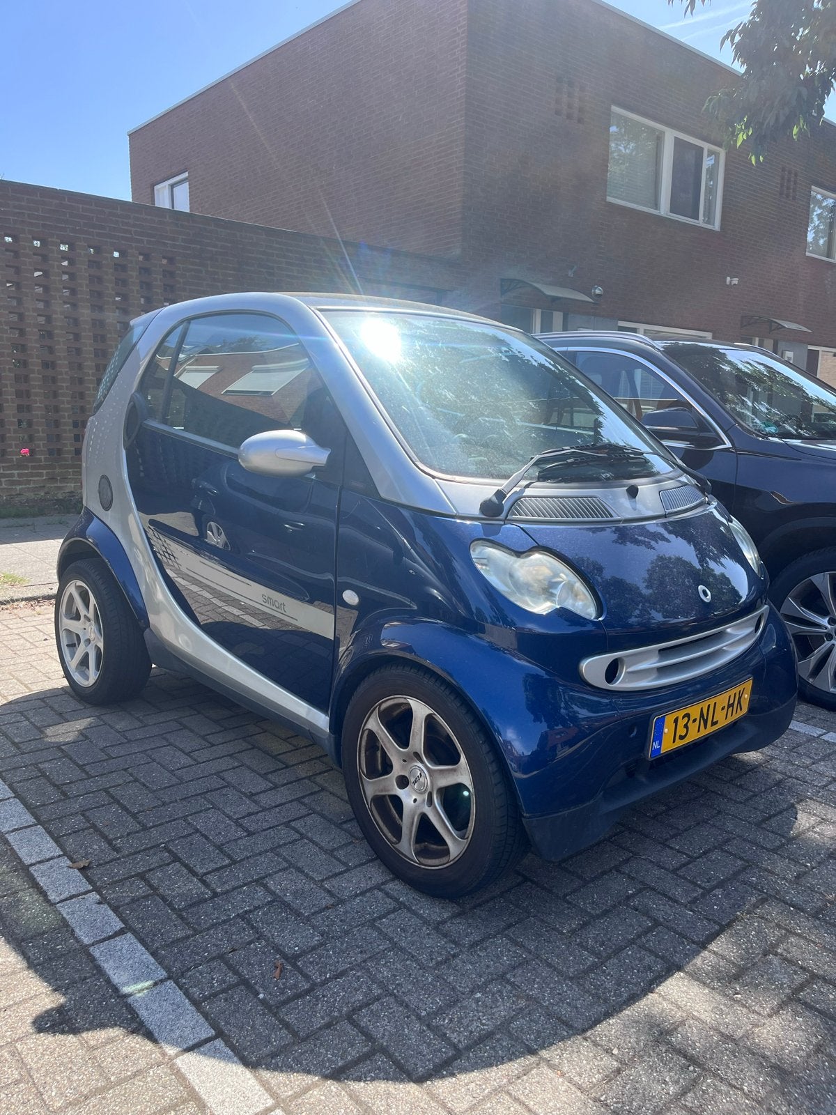 Smart 0.7 City Coupe 45KW AUT 2003 Grijs Blauw, Auto's, Achterwielaandrijving, 18 €/maand, 61 pk, Origineel Nederlands