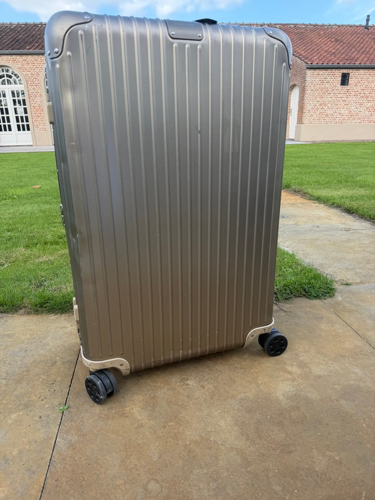 Rimowa koffer maat L titanium, Wieltjes, Gebruikt, 45 tot 55 cm, Ophalen of Verzenden