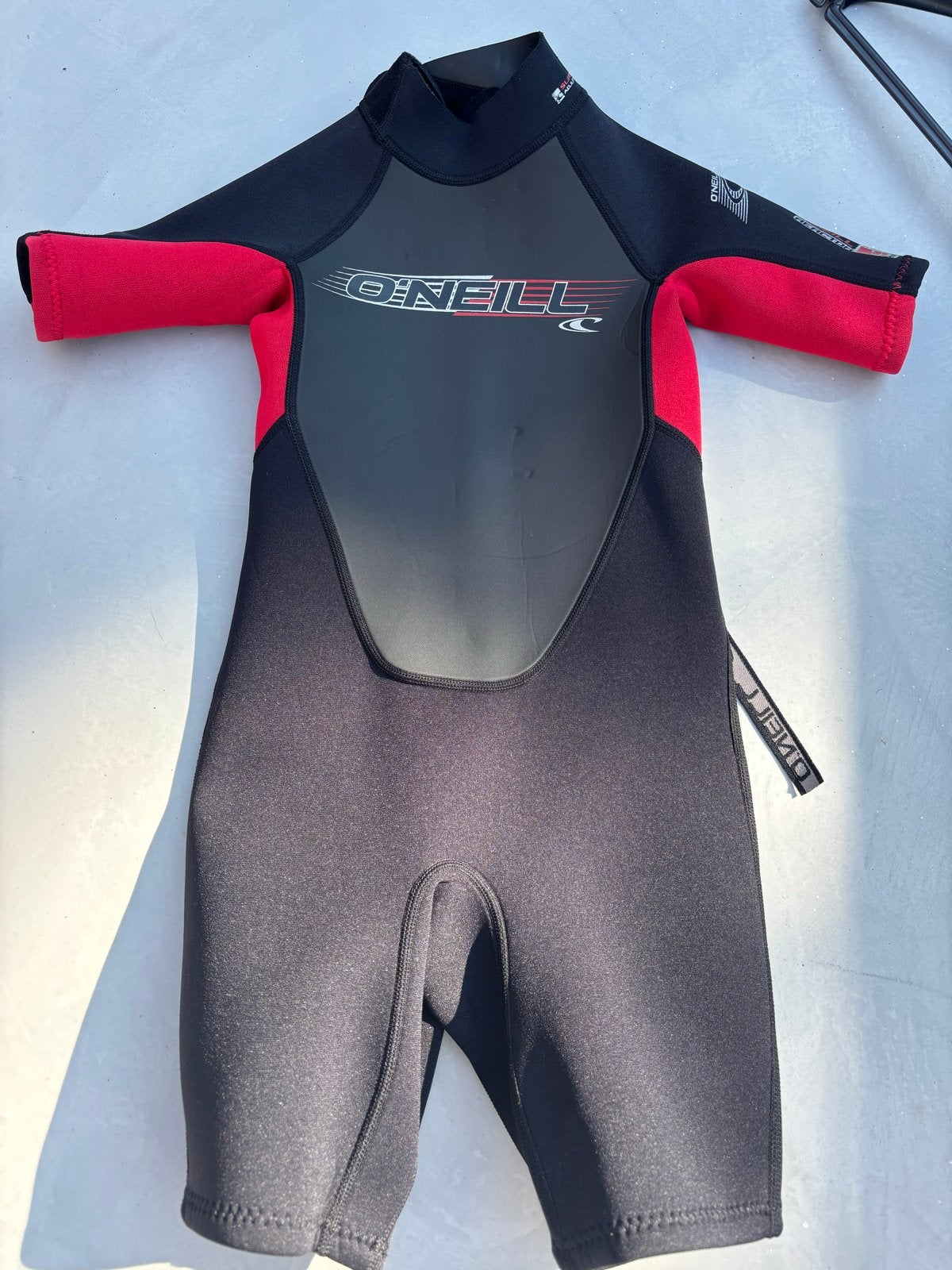 O'Neill kinder wetsuit shorty zwart-rood maat 6 (5-6 jaar), Watersport en Boten, Watersportkleding, Verzenden, Zo goed als nieuw