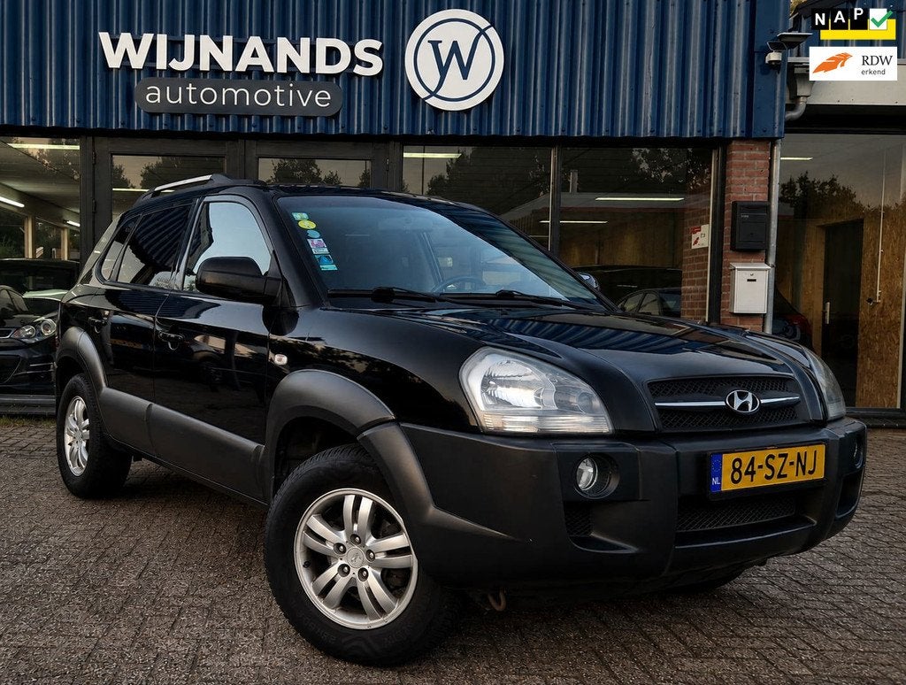 Hyundai Tucson 2.0i Style Trekhaak Clima Navigatie Cruis APK, Auto's, Hyundai, Automatische klimaatregeling, 4 cilinders, Zwart