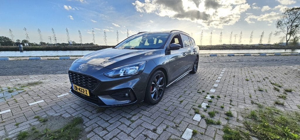 Ford Focus 1.0 Ecoboost 125pk Aut 2019 Grijs, Auto's, Dealer onderhouden, 125 pk, Overige bekleding, 1331 kg