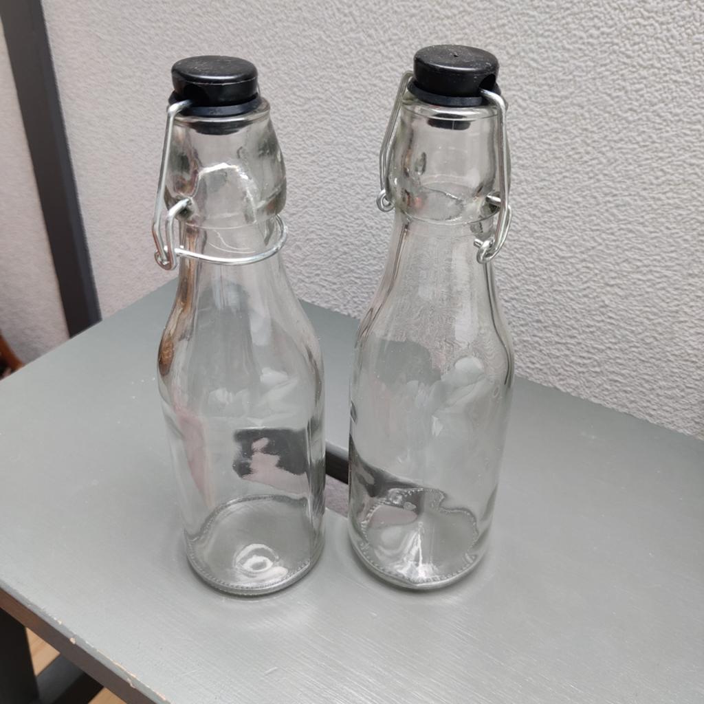 Twee flesjes, afsluitbaar., Huis en Inrichting, Woonaccessoires | Vazen, Ophalen, Overige kleuren, Glas, Minder dan 50 cm