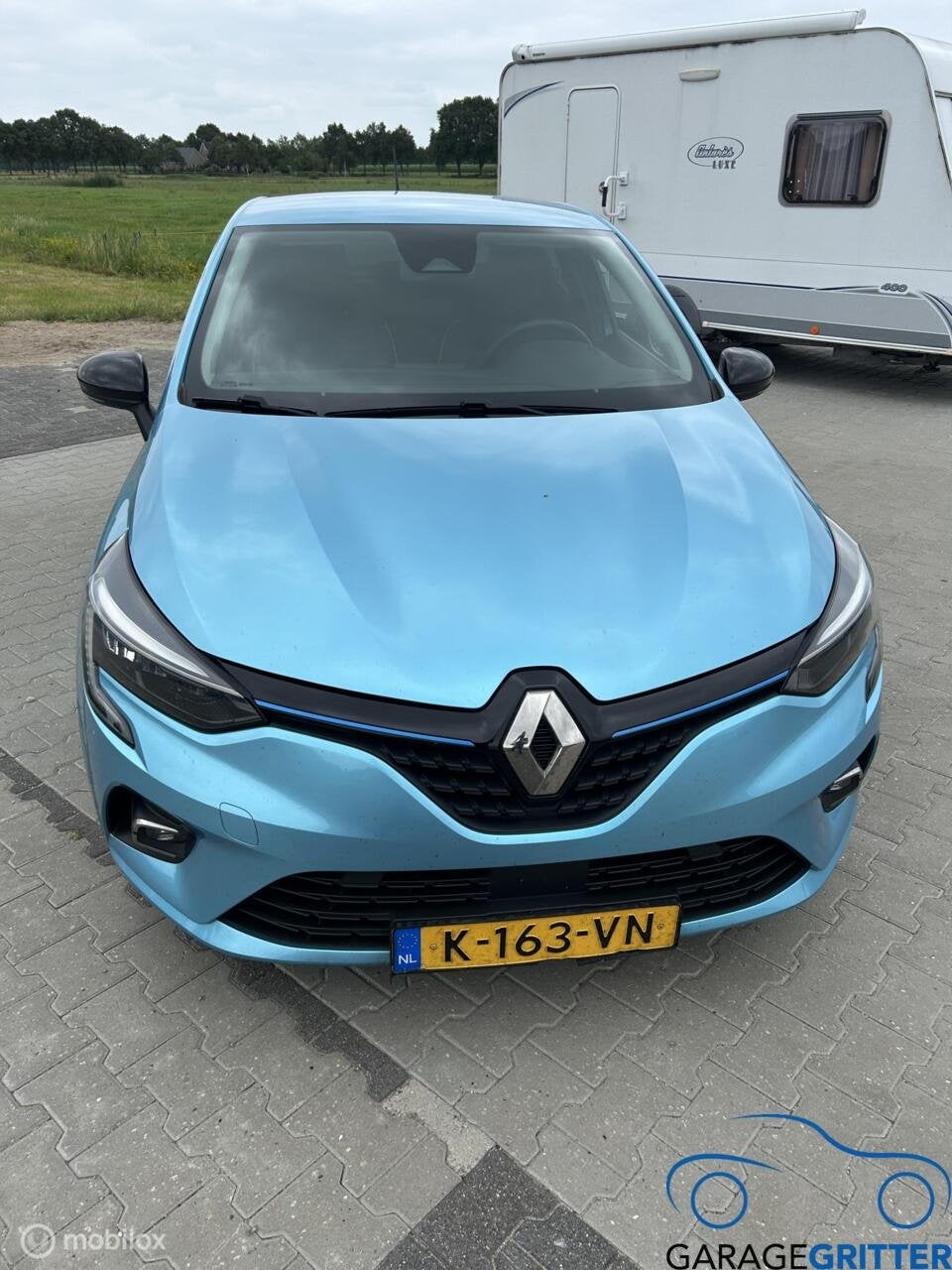 Renault Clio 1.6 E-Tech Hybrid 140 Intens, Auto's, Gebruikt, Euro 6, 4 cilinders, Blauw
