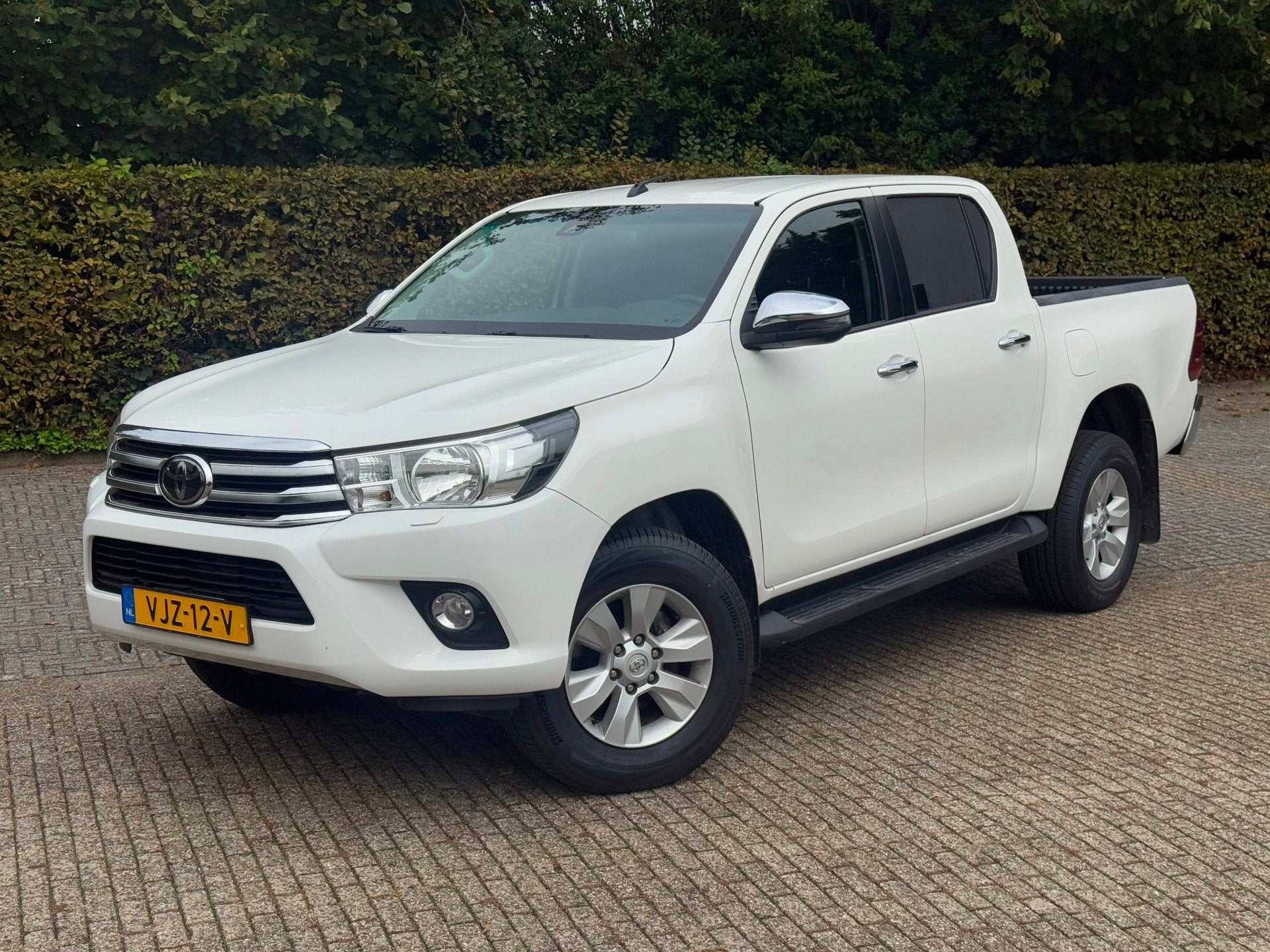 Toyota HiLux Toyota HiLux - 2.4 D-4D Cool Comfort Double Cab, Auto's, Automaat, Stof, Gebruikt, Euro 6