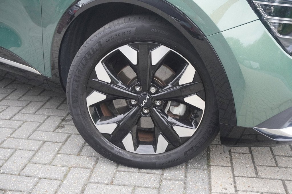 Kia Sportage 1.6 T-GDi Plug-in Hybrid AWD DynamicPlusLine /, Auto's, Kia, Automaat, 1350 kg, Gebruikt, 4 cilinders