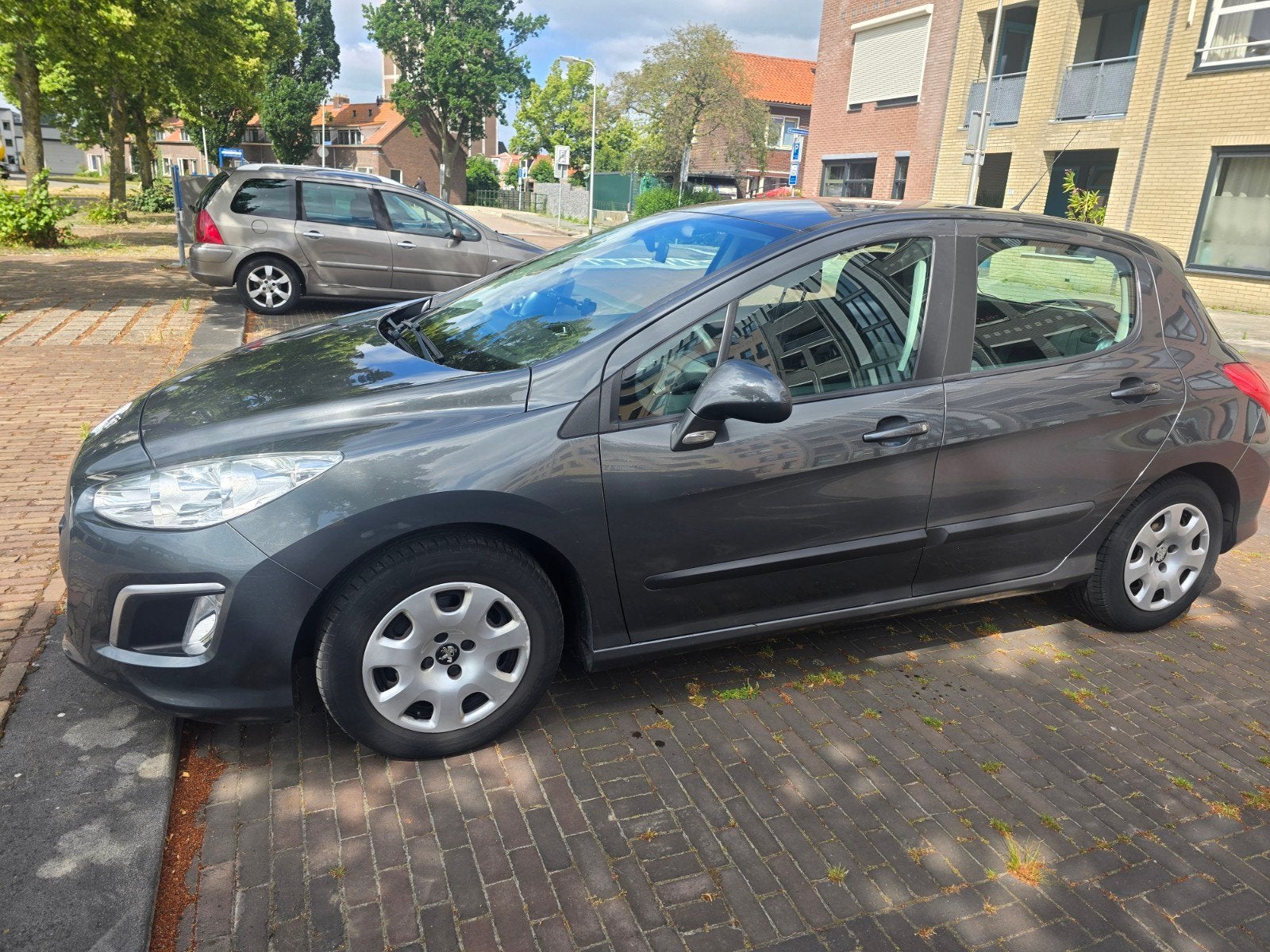 Peugeot 308 1.6 VTI 16V 5-DRS 2011 Grijs, Auto's, Voorwielaandrijving, Stof, 680 kg, 4 cilinders