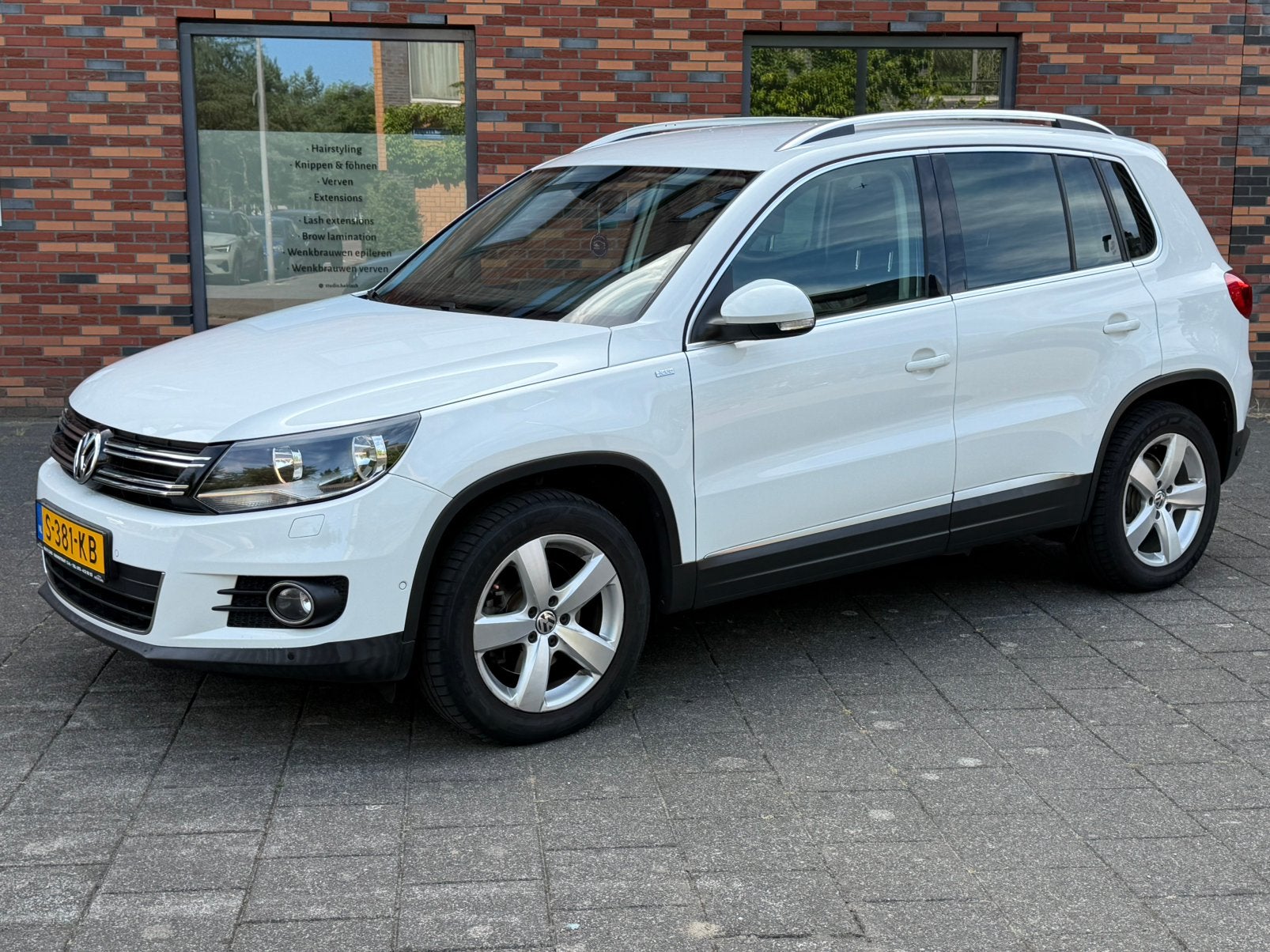 Volkswagen Tiguan 1.4 TSI Sport&Style/Automaat/Trekhaak/PDC, Stof, 1800 kg, 4 cilinders, 160 pk