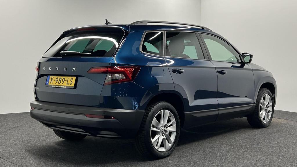 Skoda Karoq 1.0 TSI Business Edition CARPLAY NAVI ECC CRUISE, Voorwielaandrijving, Stof, Gebruikt, Met garantie (alle)